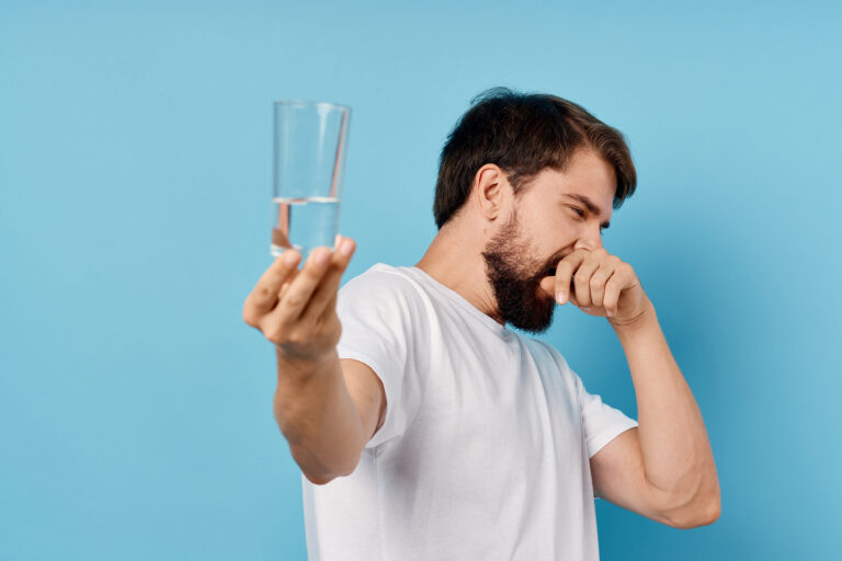 bearded man glass of water isolated background